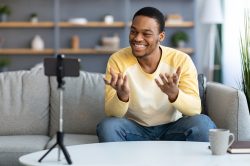 https---app.unbounce.com-publish-assets-88e82ee2-0917-11ed-a803-02423b6fa092-1s0pixc-cheerful-african-american-man-influencer-broadcast-mqg4jqk_10mm0f2000000000000000